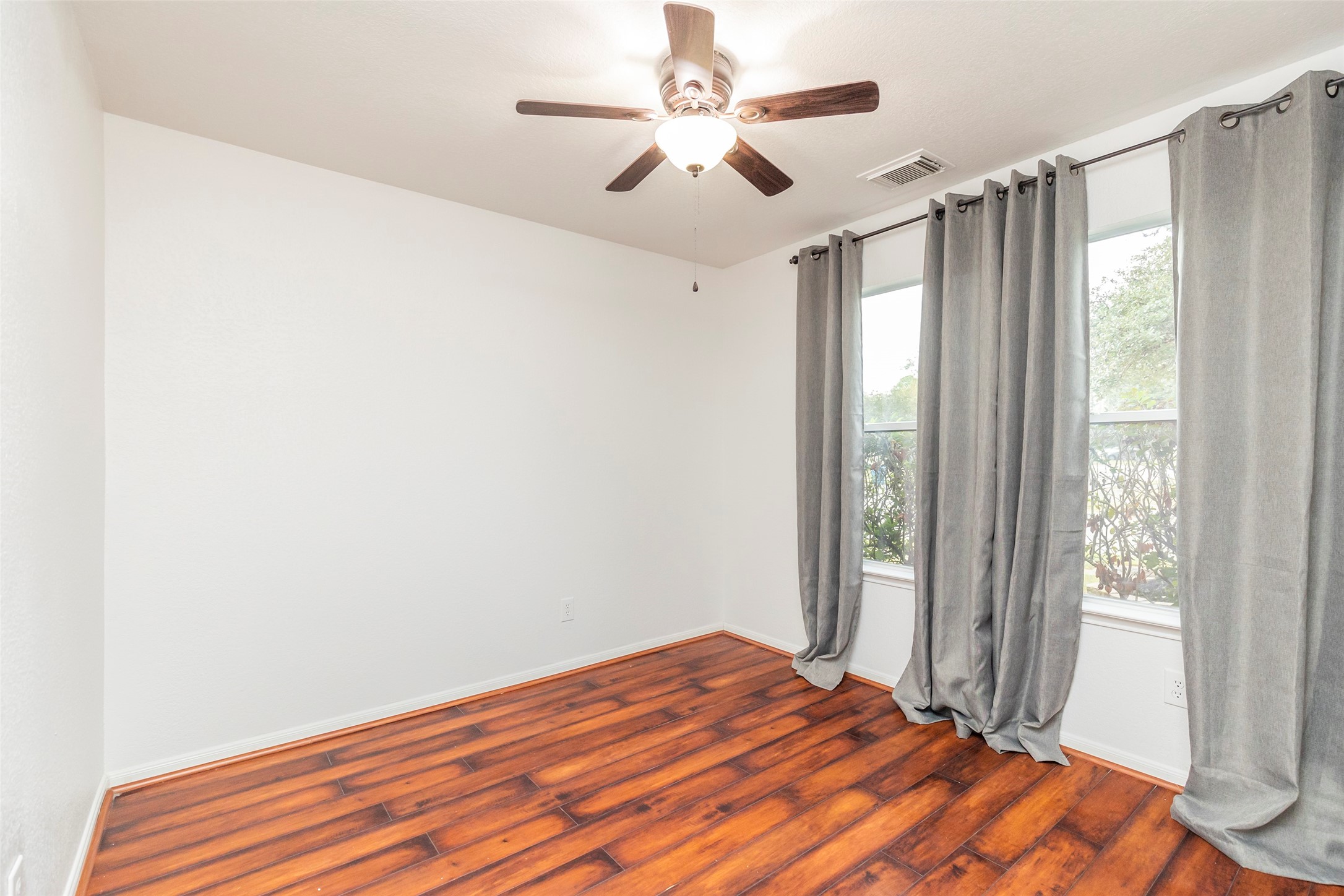 21202 Fire Wind Court Spring, TX 77379 - Photo 18 of 21 Additional Bedroom. Flexible spaces ideal for guests, work, or play.