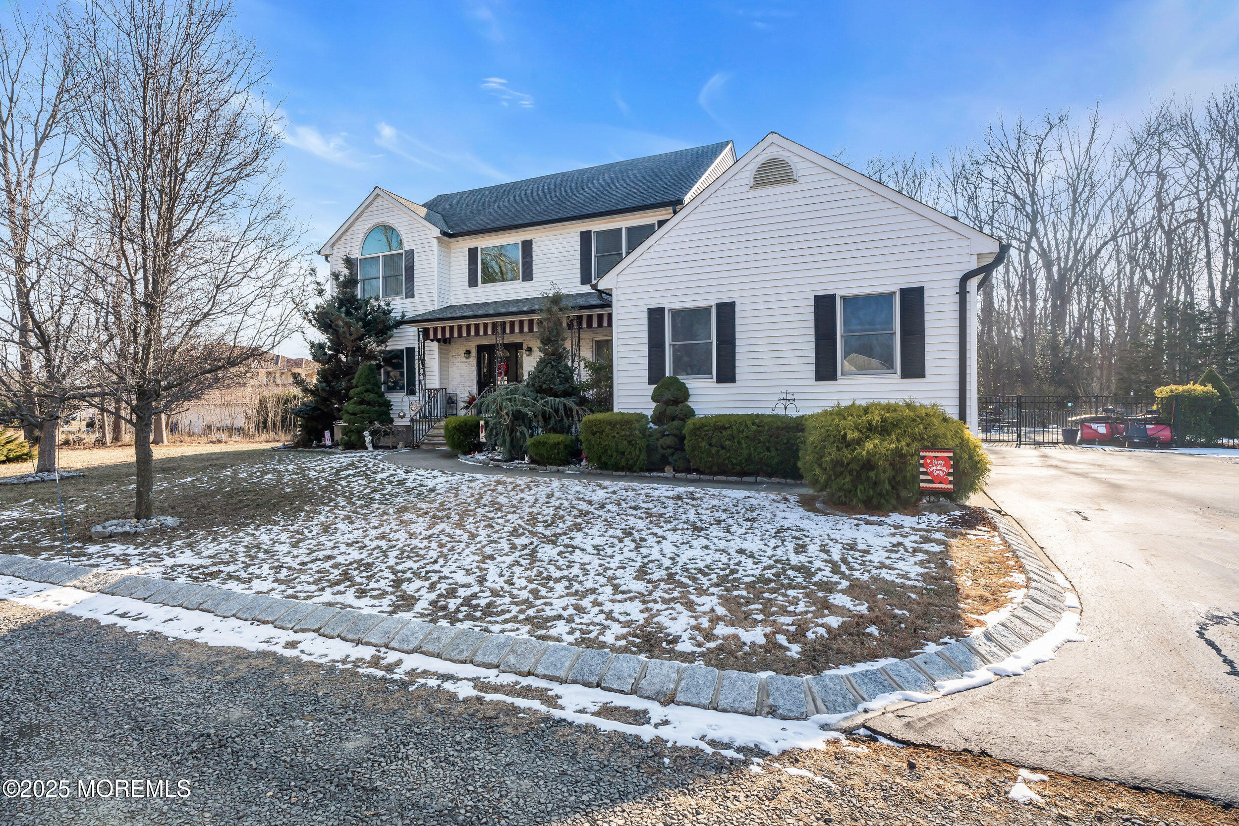 220 Whalepond Road Eatontown, NJ 07724 - Photo 14 of 54 a front view of a house with garden