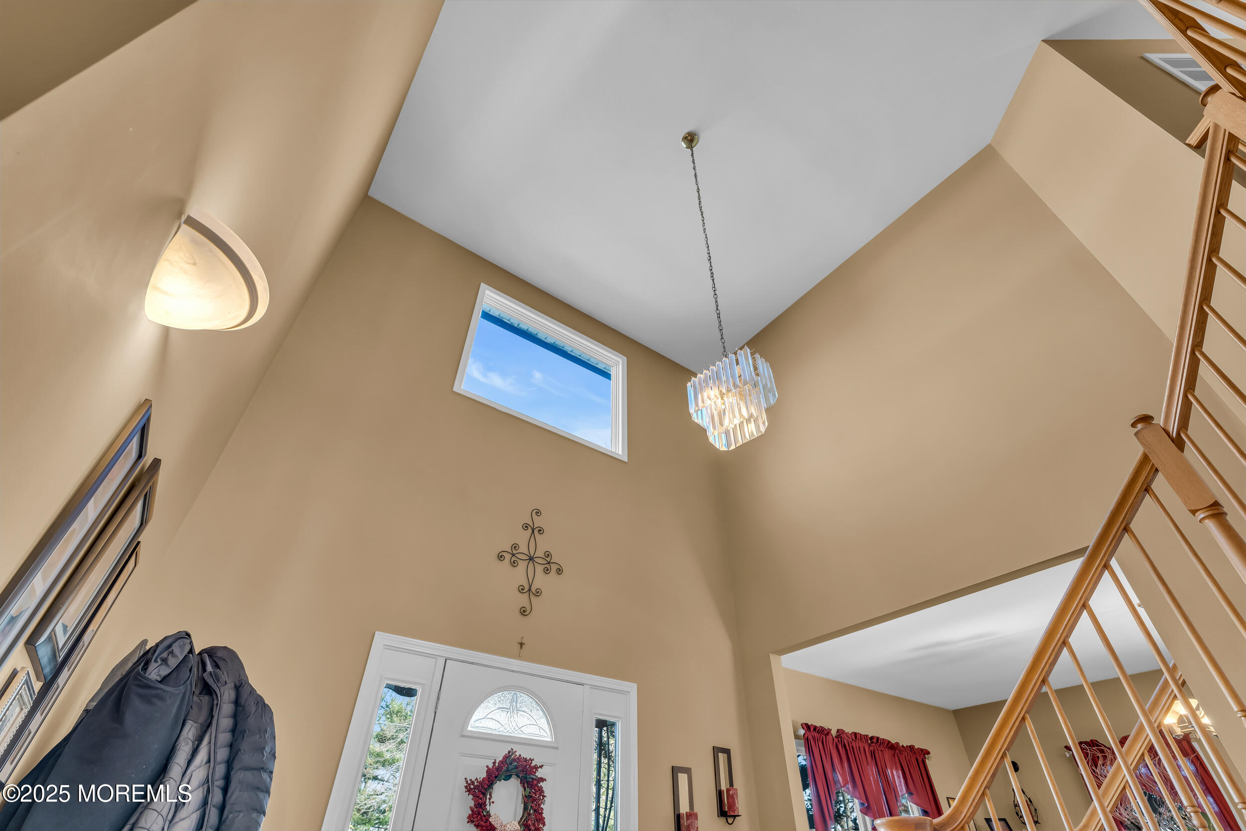 220 Whalepond Road Eatontown, NJ 07724 - Photo 18 of 54 a view of a hallway with paintings on the wall