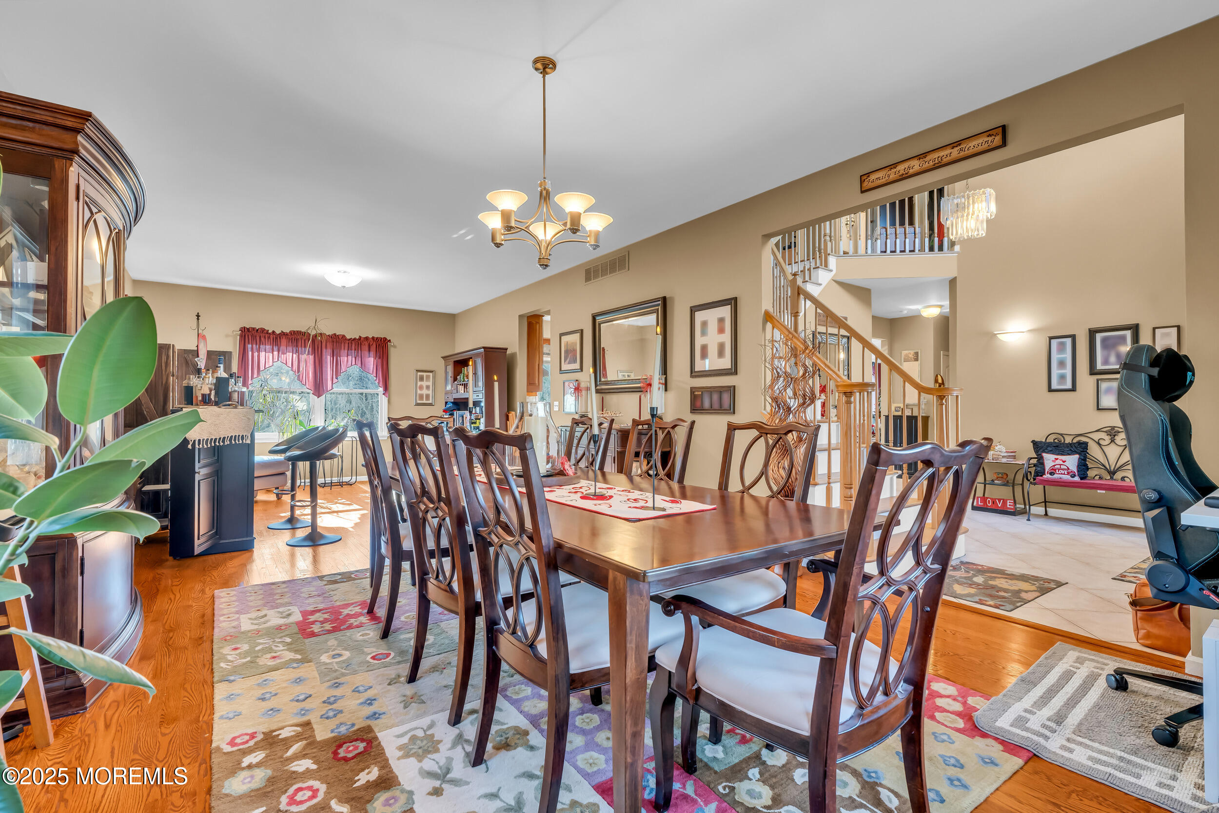 220 Whalepond Road Eatontown, NJ 07724 - Photo 23 of 54 a view of a dining room with furniture and wooden floor