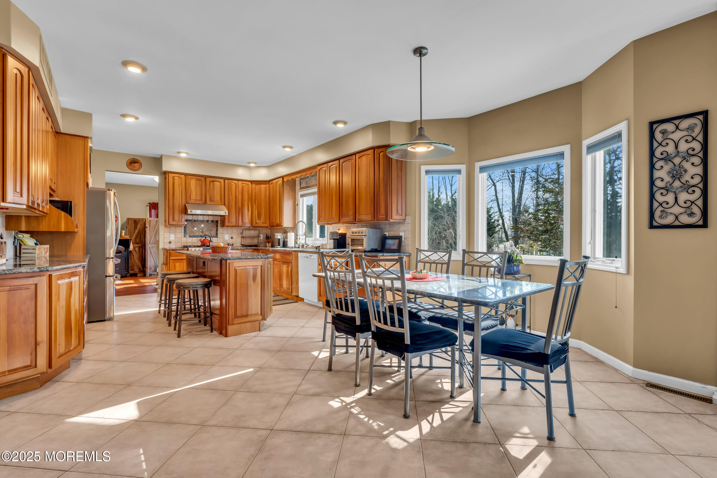 220 Whalepond Road Eatontown, NJ 07724 - Photo 26 of 54 a view of a dining room with furniture window and outside view