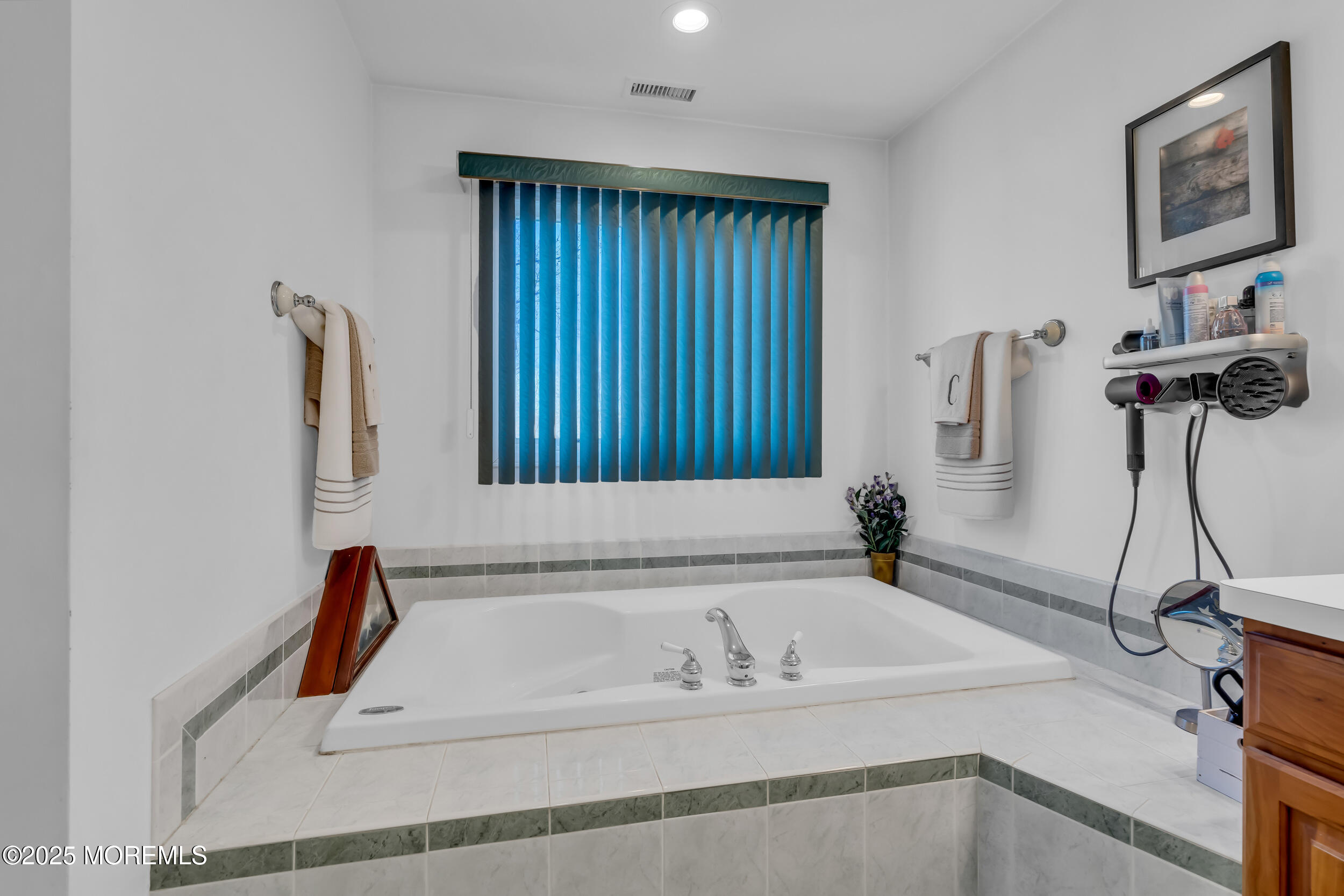 220 Whalepond Road Eatontown, NJ 07724 - Photo 42 of 54 a bathroom with a bathtub and a shower