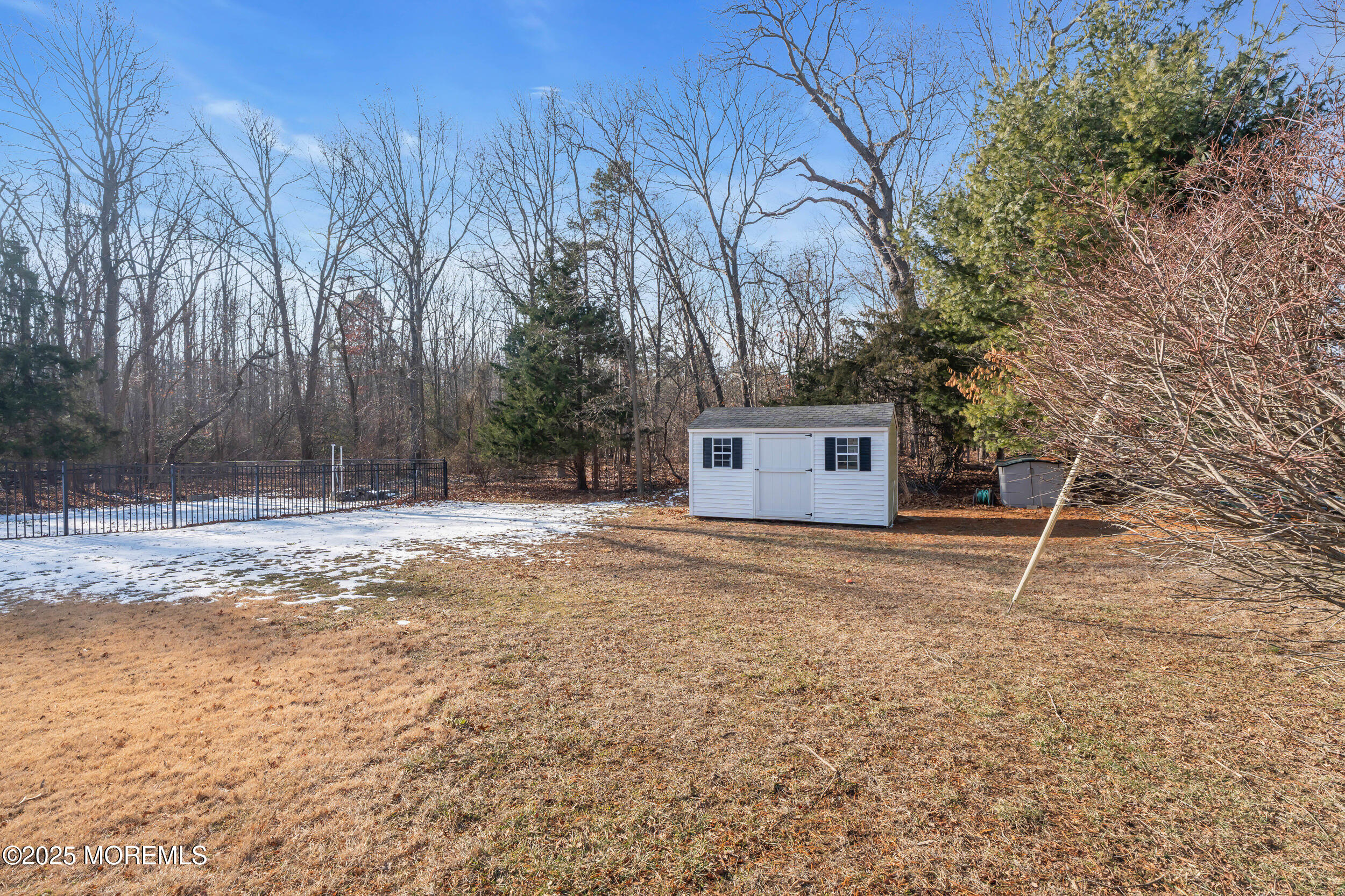 220 Whalepond Road Eatontown, NJ 07724 - Photo 47 of 54 a house with trees in front of it
