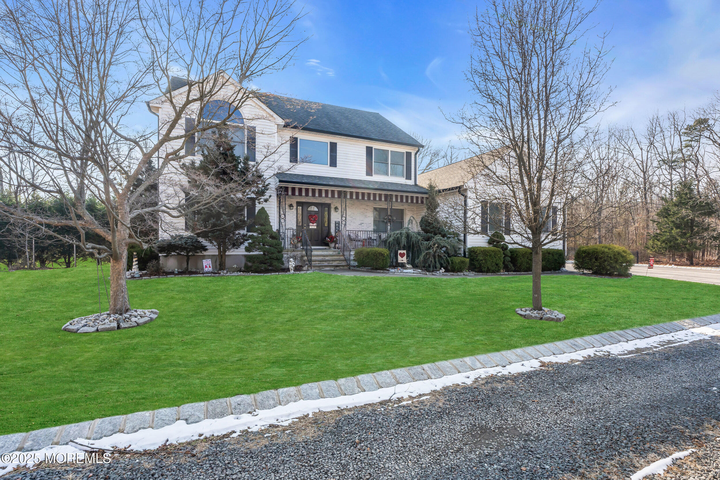 220 Whalepond Road Eatontown, NJ 07724 - Photo 54 of 54 a front view of a house with a yard