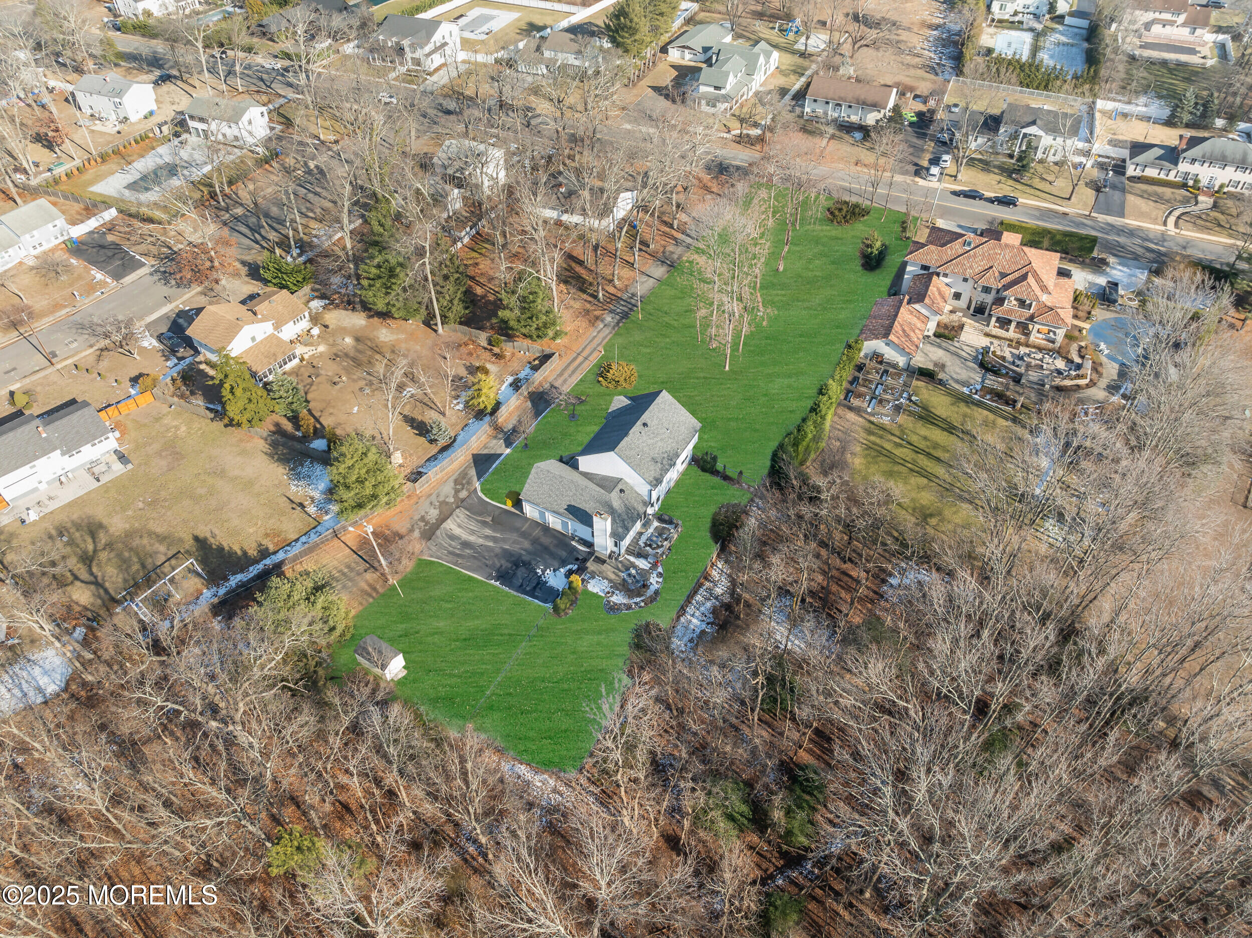220 Whalepond Road Eatontown, NJ 07724 - Photo 9 of 54 an aerial view of a house with a yard basket ball court