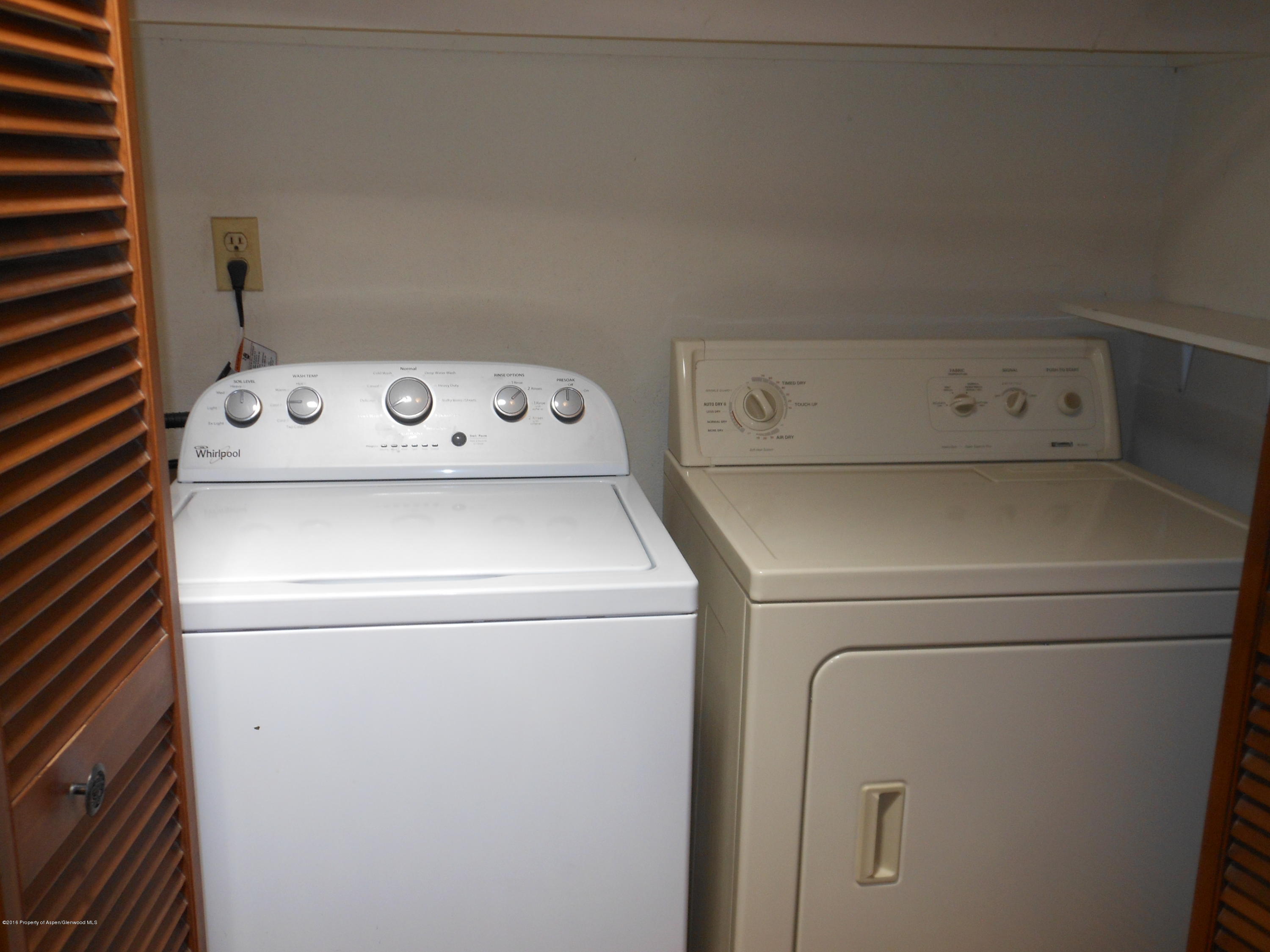 817 Cedar Drive Rifle, CO 81650 - Photo 18 of 24 a utility room with dryer and washer