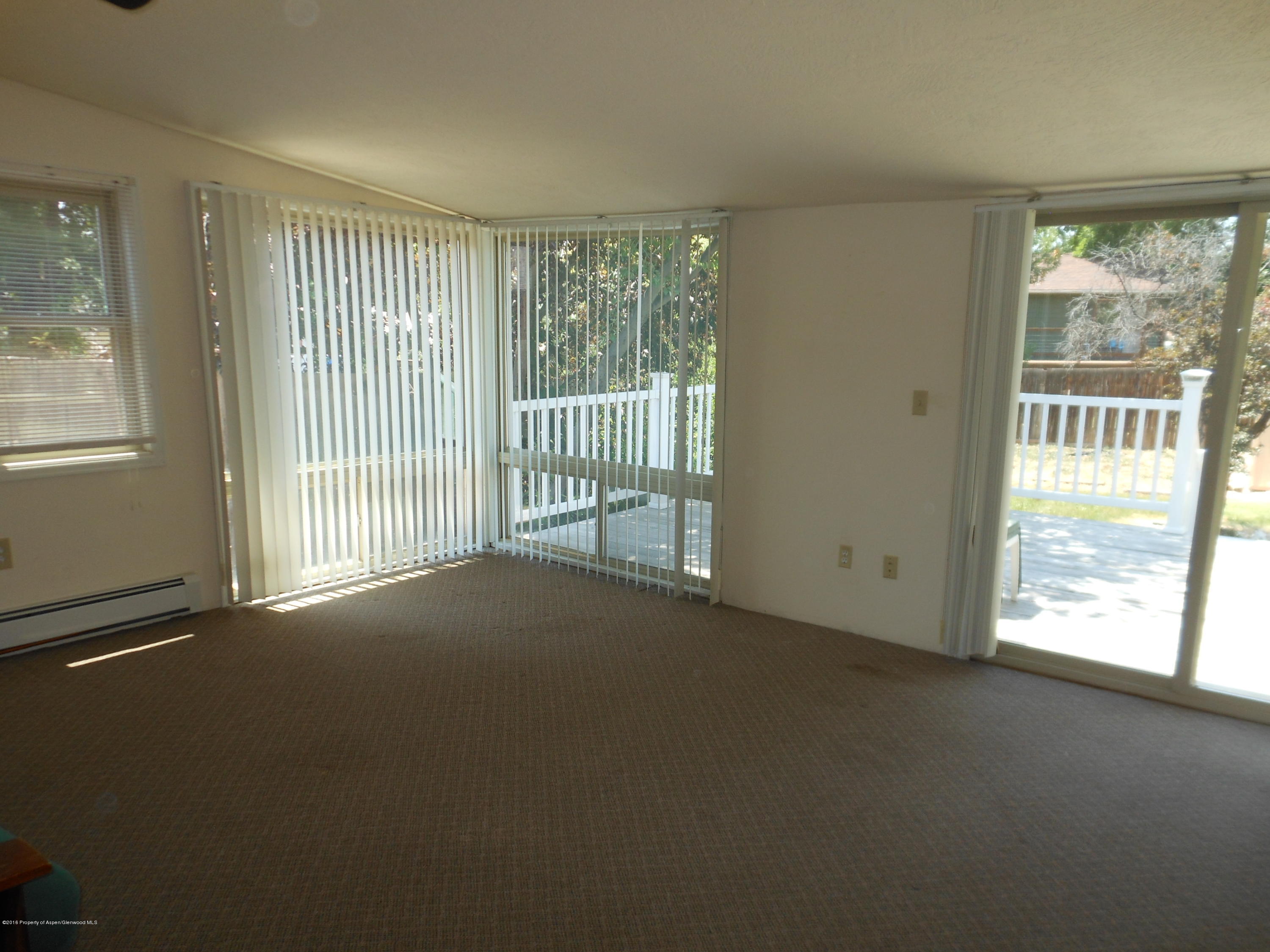 817 Cedar Drive Rifle, CO 81650 - Photo 19 of 24 en empty room with windows