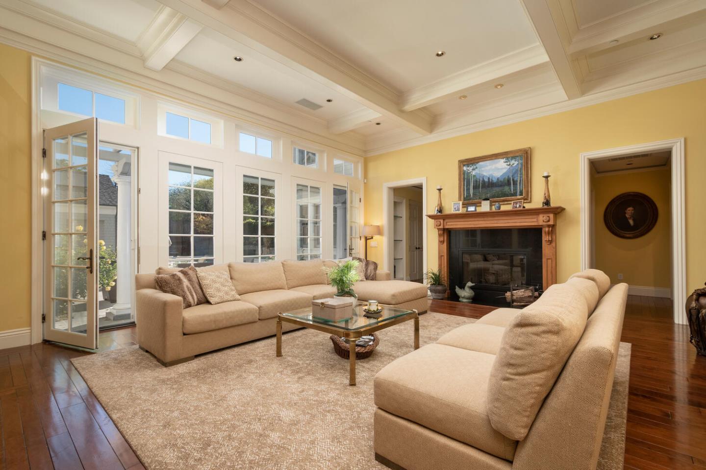 209 Bridge Road Hillsborough, CA 94010 - Photo 11 of 38 a living room with furniture and a fireplace