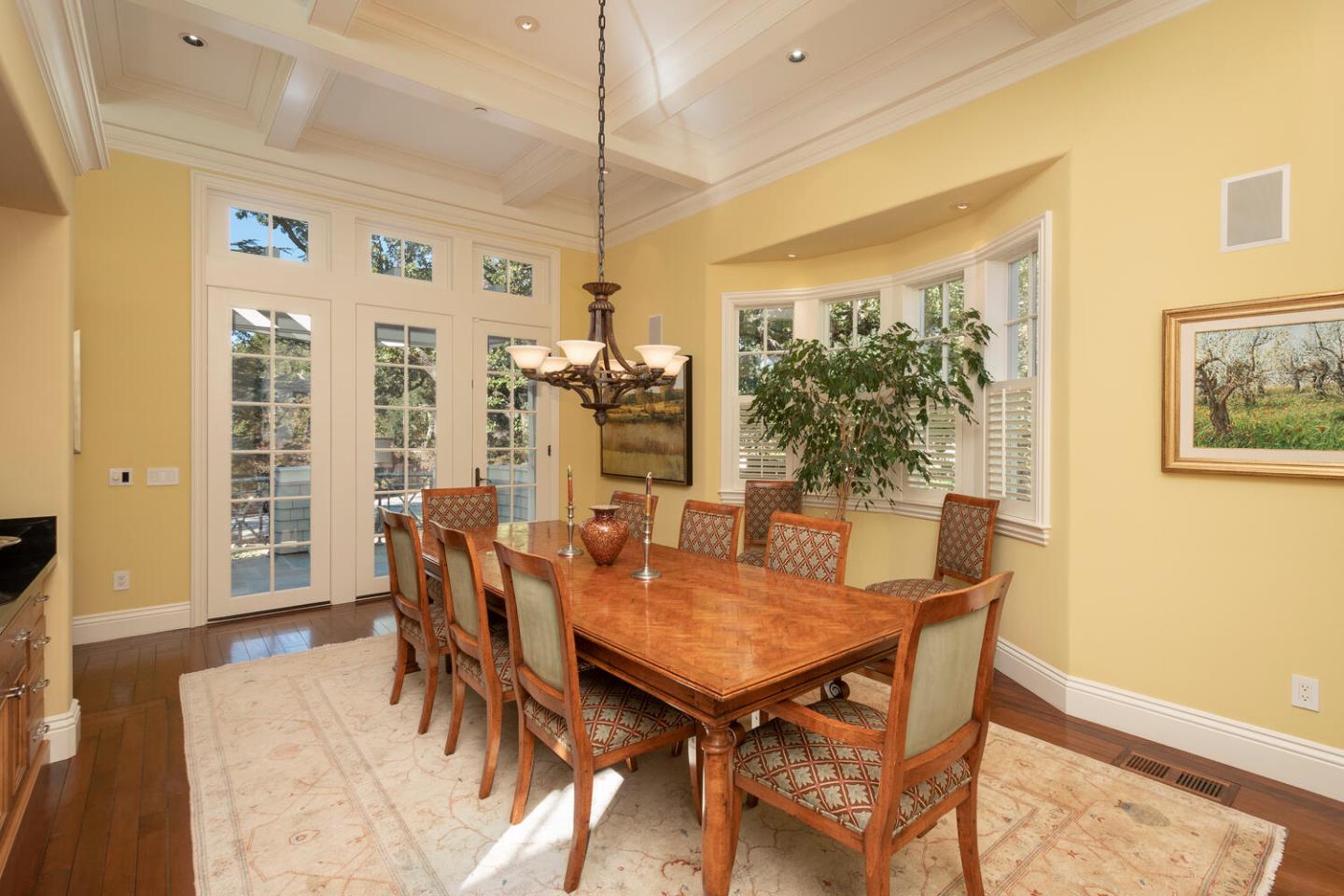 209 Bridge Road Hillsborough, CA 94010 - Photo 12 of 38 a view of a dining room with furniture window and wooden floor