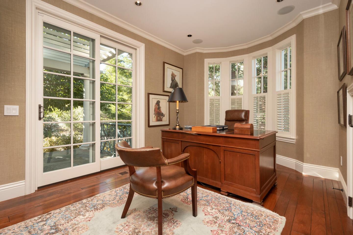 209 Bridge Road Hillsborough, CA 94010 - Photo 18 of 38 a view of a workspace with furniture and a window