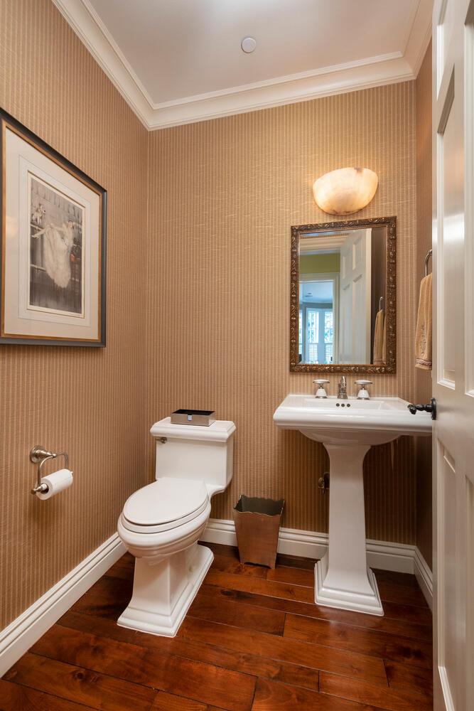 209 Bridge Road Hillsborough, CA 94010 - Photo 19 of 38 a room with a sink and a mirror