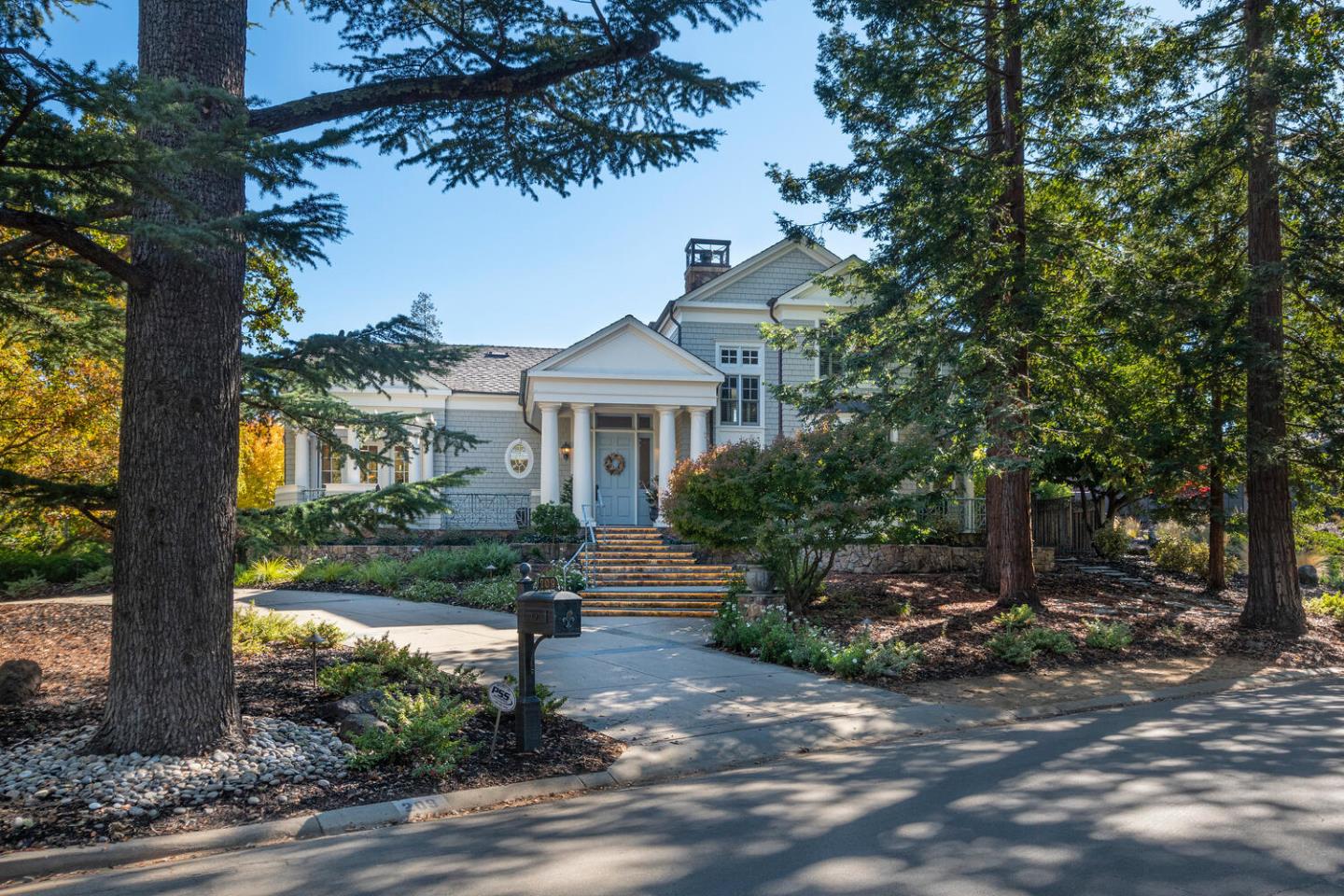 209 Bridge Road Hillsborough, CA 94010 - Photo 3 of 38 a front view of a house with garden