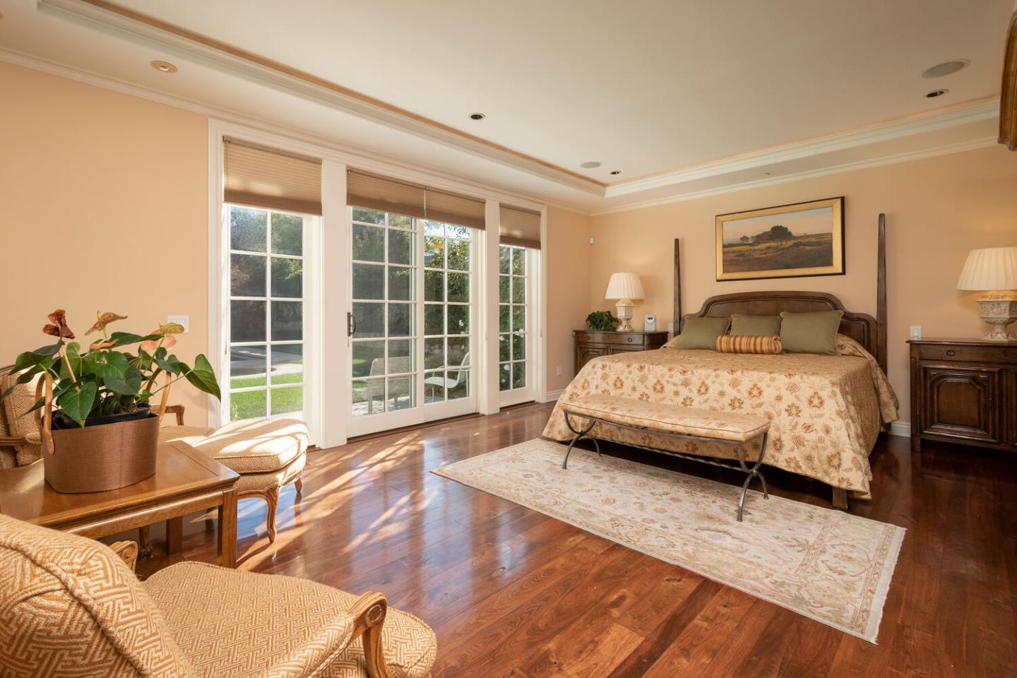 209 Bridge Road Hillsborough, CA 94010 - Photo 24 of 38 a bedroom with a bed and wooden floor