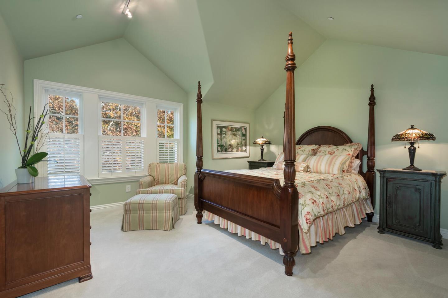 209 Bridge Road Hillsborough, CA 94010 - Photo 29 of 38 a bedroom with a bed chairs and window