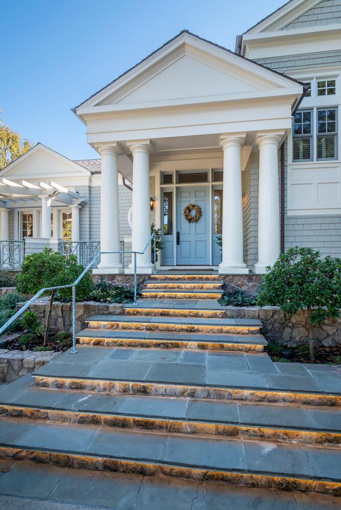 209 Bridge Road Hillsborough, CA 94010 - Photo 7 of 38 a view of a house with a dining table and chairs
