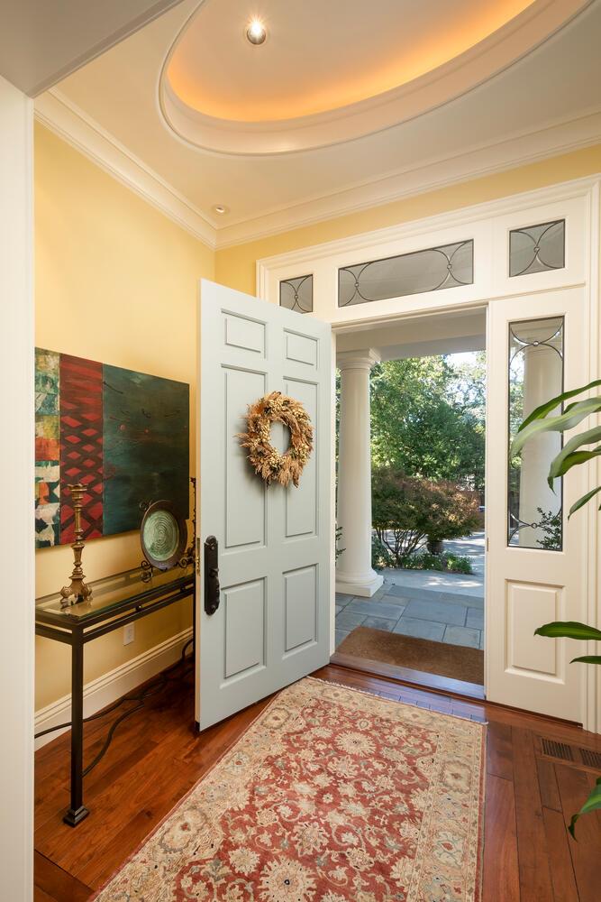 209 Bridge Road Hillsborough, CA 94010 - Photo 8 of 38 a living room with furniture and a floor to ceiling window