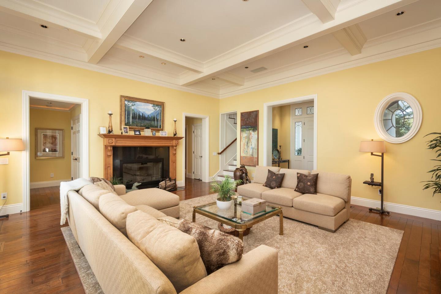 209 Bridge Road Hillsborough, CA 94010 - Photo 10 of 38 a living room with furniture and a fireplace