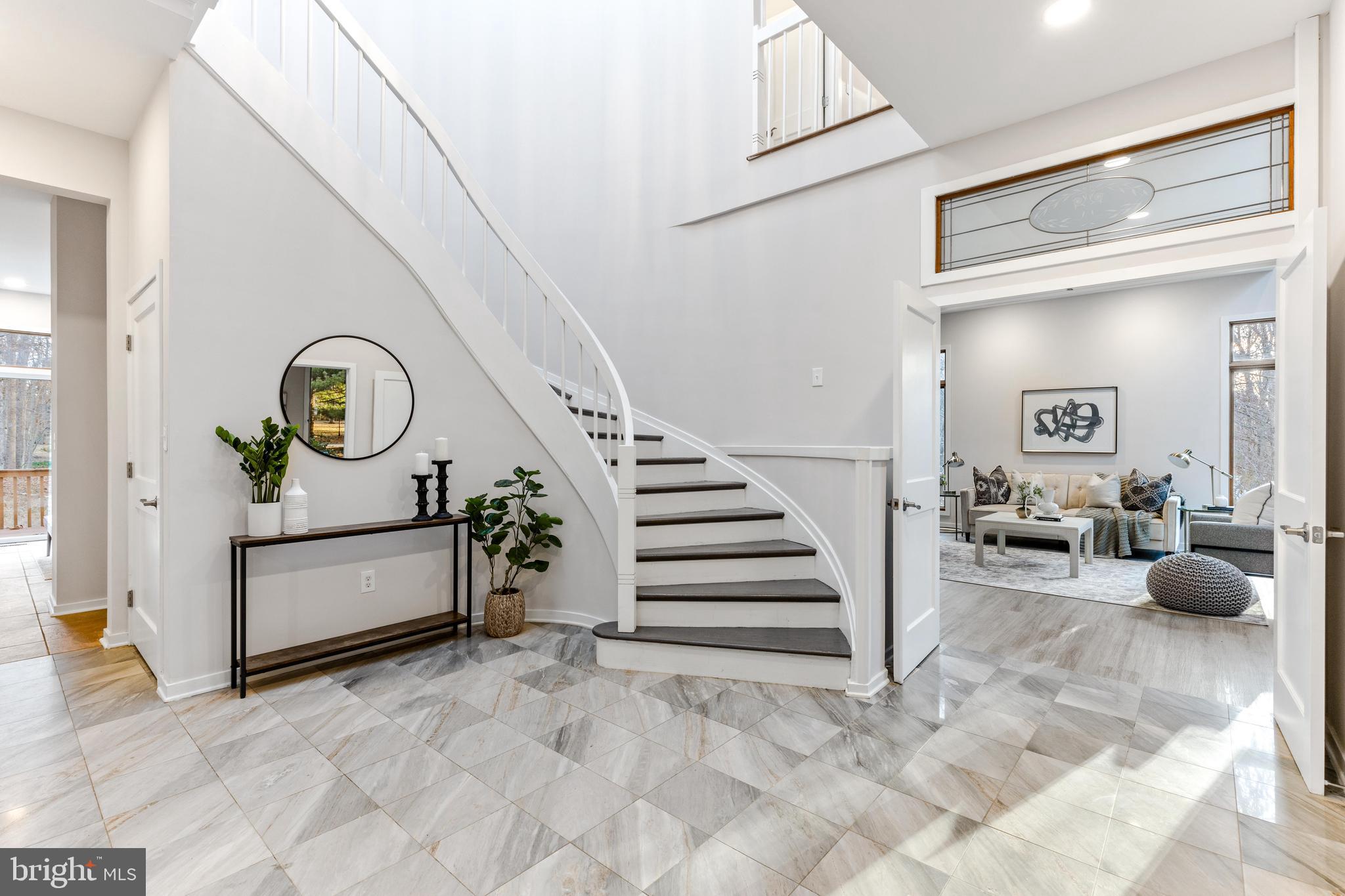 Incredible natural light in this grand foyer!