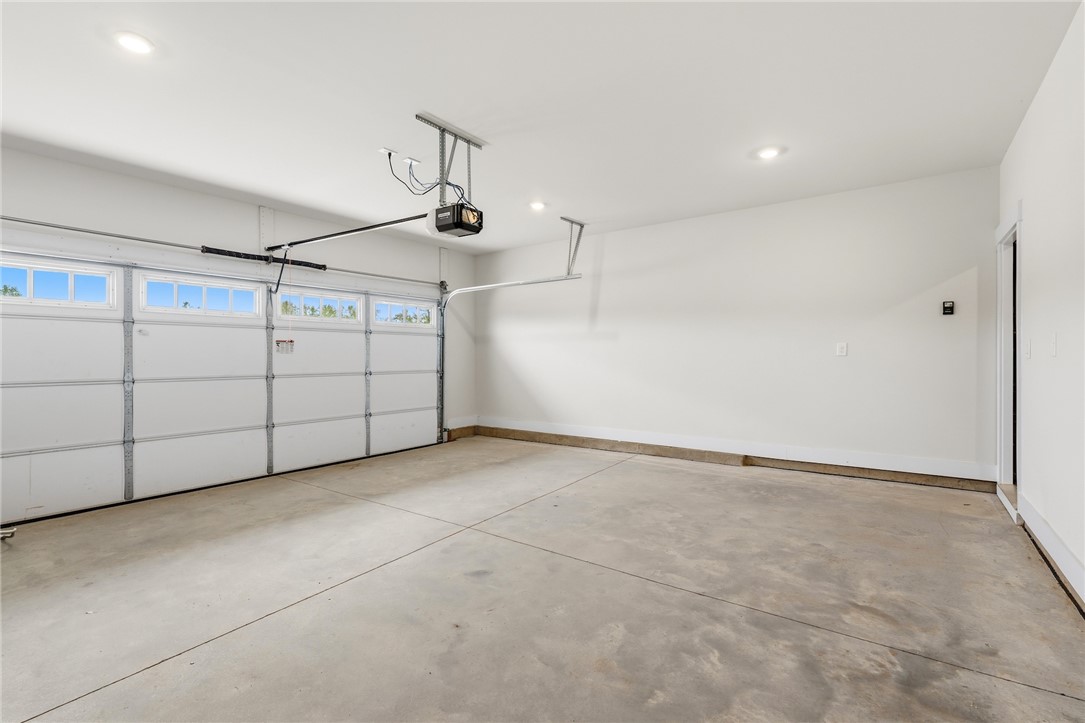 319 Summerall Drive Anderson, SC 29621 - Photo 35 of 37 This spacious garage offers ample storage and direct home access.