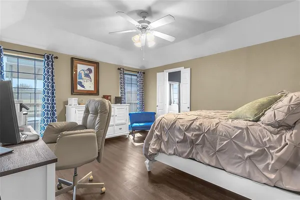 a bedroom with a bed and furniture