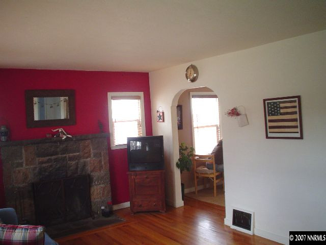 623 West 11th Street Reno, NV 89503 - Photo 3 of 8 a living room with furniture and wooden floor