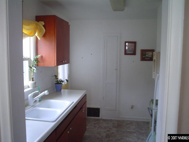 623 West 11th Street Reno, NV 89503 - Photo 5 of 8 a bathroom with a sink and a mirror