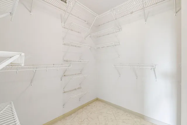 a table and chairs in a patio