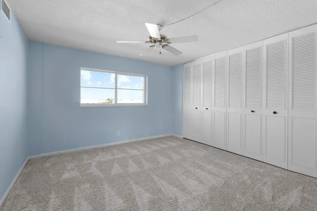 a view of a swimming pool with a terrace