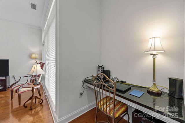 a view of a workspace with furniture