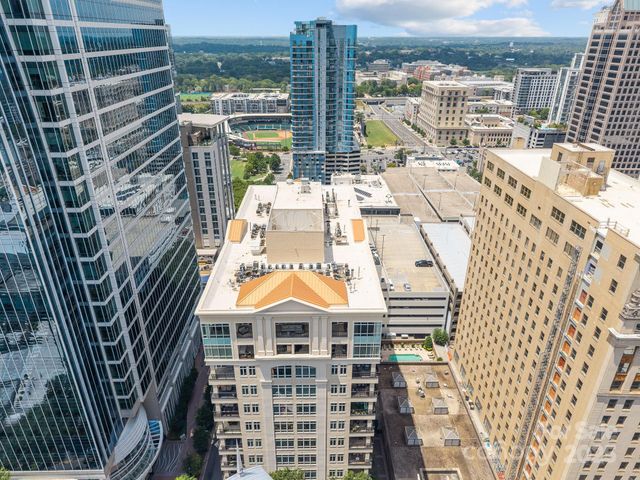 a view of a city with tall buildings