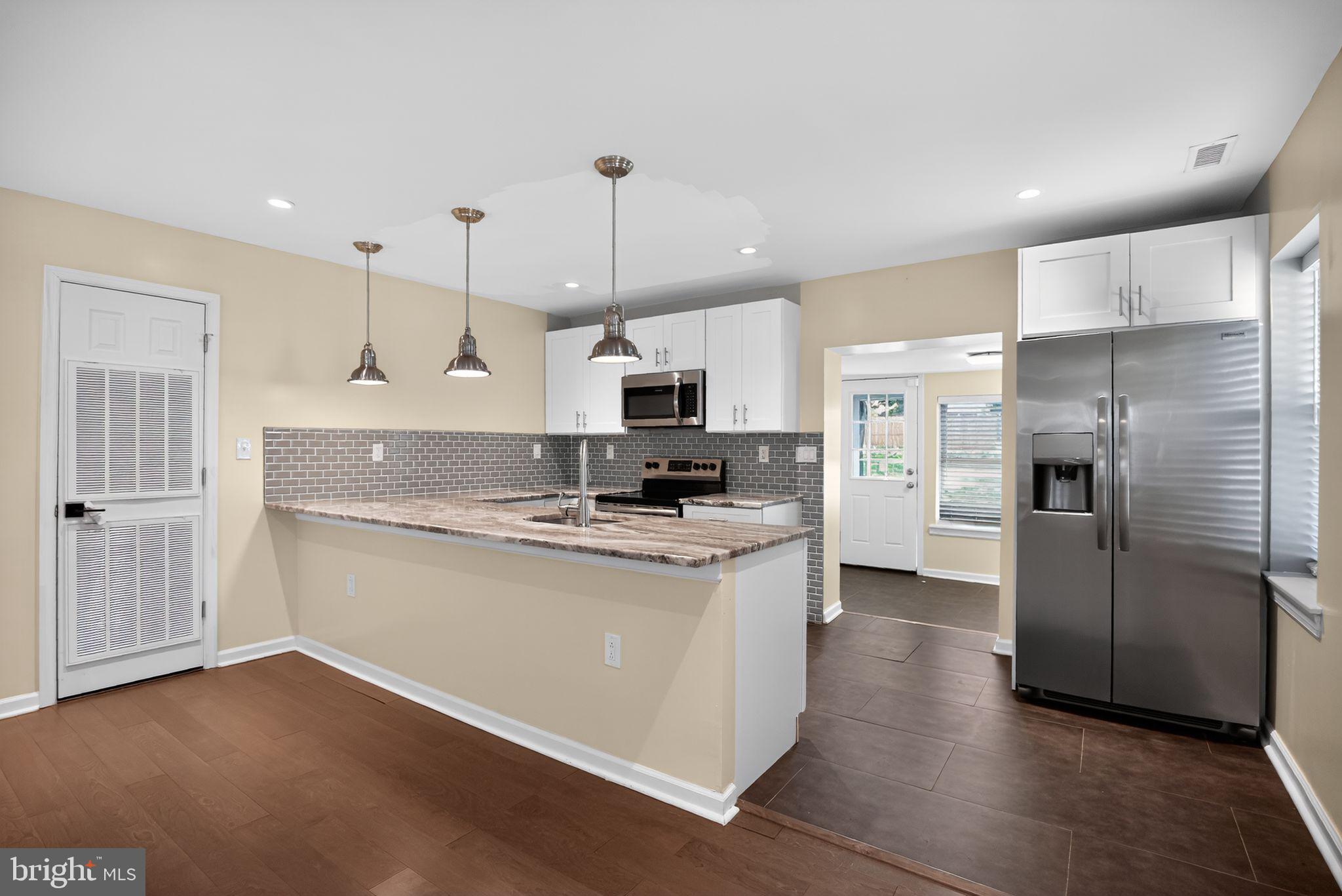 2646 Jenkintown Road Glenside, PA 19038 - Photo 12 of 29 Kitchen with breakfast bar