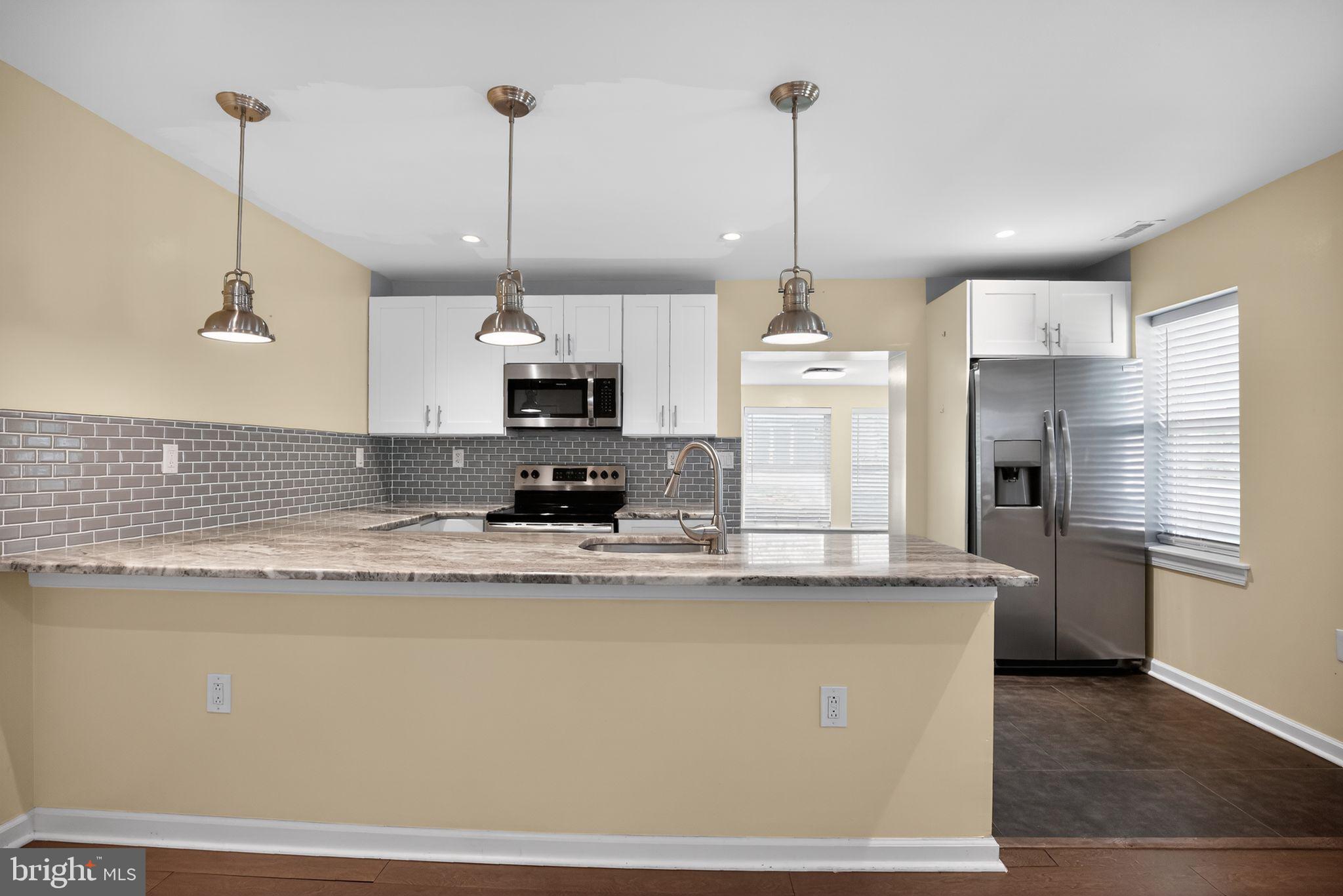 2646 Jenkintown Road Glenside, PA 19038 - Photo 13 of 29 Kitchen with breakfast bar