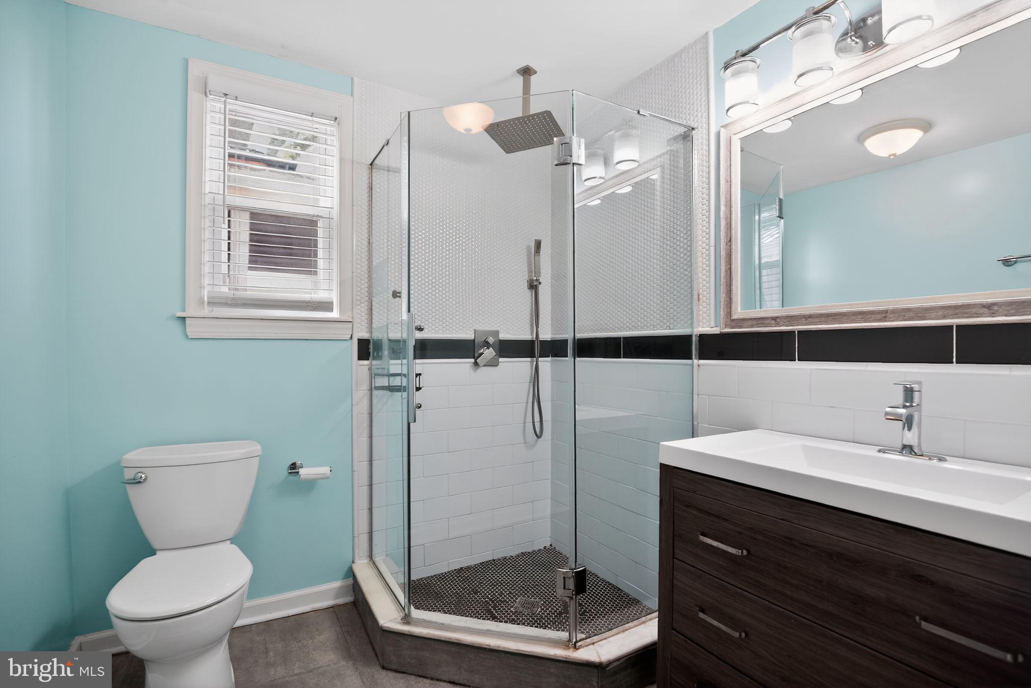 2646 Jenkintown Road Glenside, PA 19038 - Photo 18 of 29 Primary bath w/ stall shower, tile floor and walls