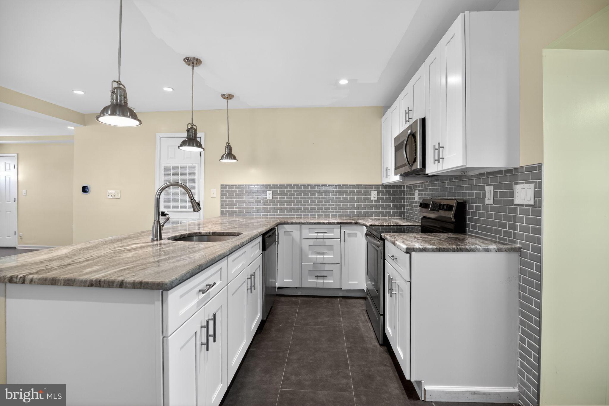 2646 Jenkintown Road Glenside, PA 19038 - Photo 8 of 29 Kitchen with granite countertops