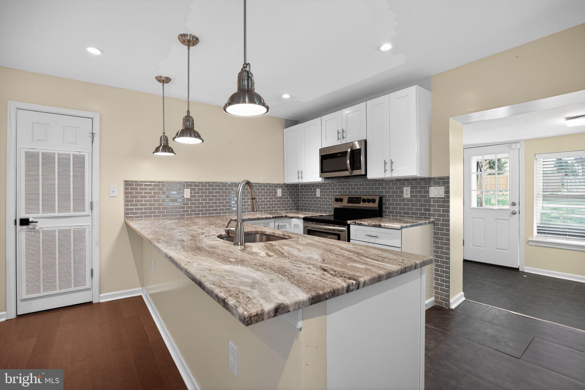 2646 Jenkintown Road Glenside, PA 19038 - Photo 9 of 29 Kitchen with breakfast bar