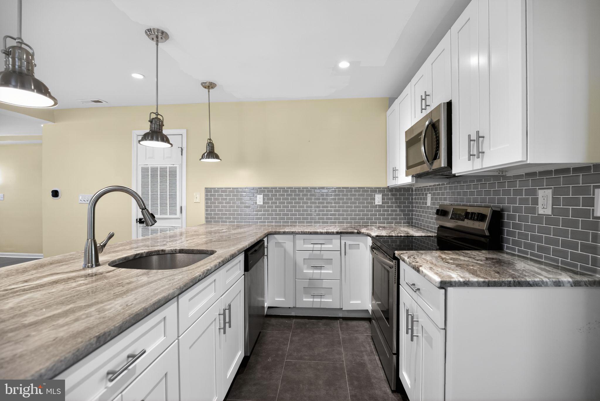 2646 Jenkintown Road Glenside, PA 19038 - Photo 10 of 29 Kitchen with subway tile backsplash