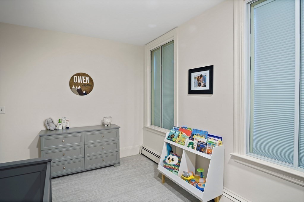 28 Everett Street, Unit 2 Boston, MA 02130 - Photo 23 of 25 a room with toys and dresser