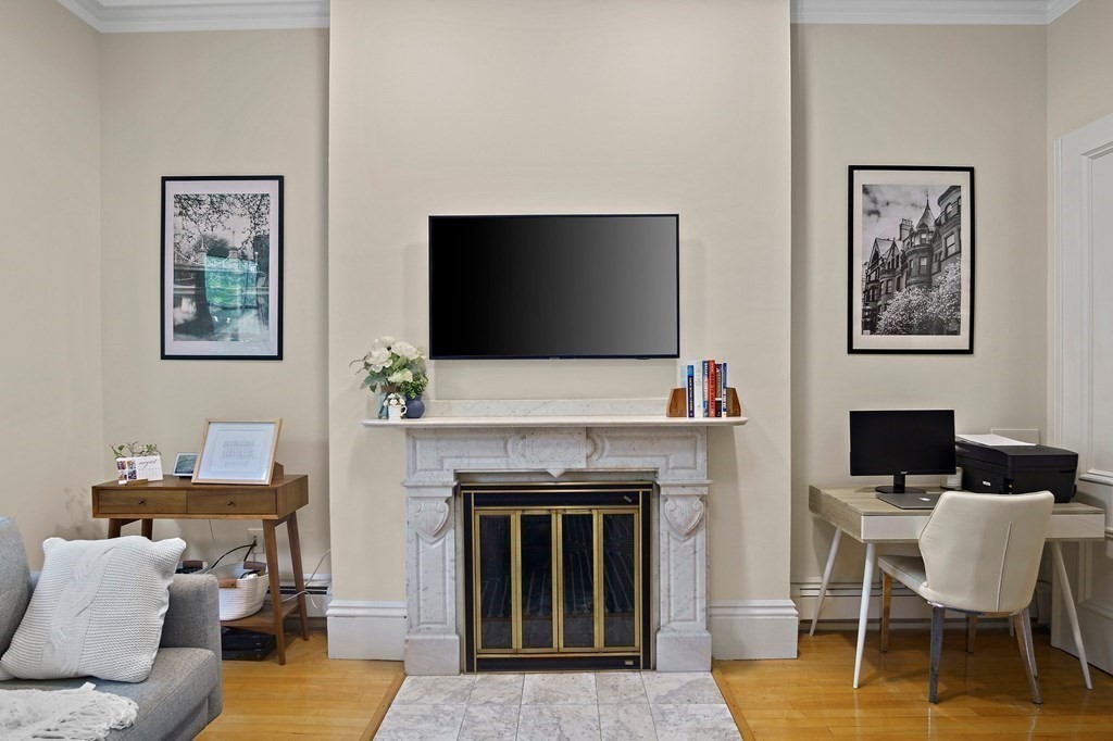 28 Everett Street, Unit 2 Boston, MA 02130 - Photo 7 of 25 a living room with furniture and a flat screen tv