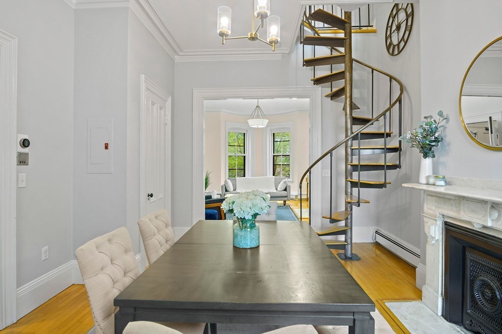 28 Everett Street, Unit 2 Boston, MA 02130 - Photo 8 of 25 a view of kitchen and dining room with furniture