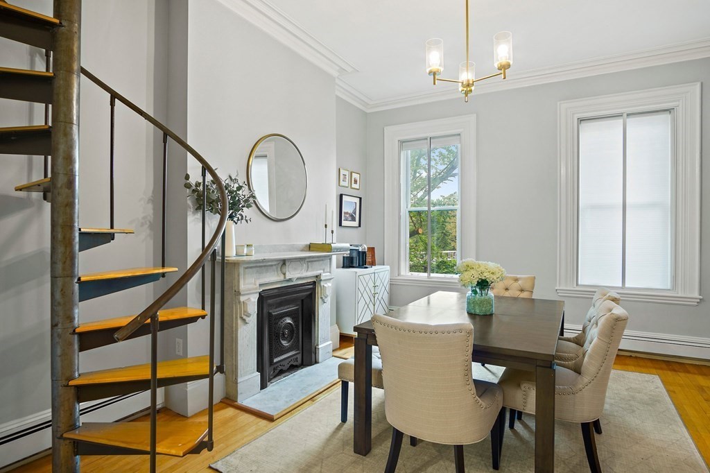 28 Everett Street, Unit 2 Boston, MA 02130 - Photo 10 of 25 a view of a dining room with furniture window and wooden floor