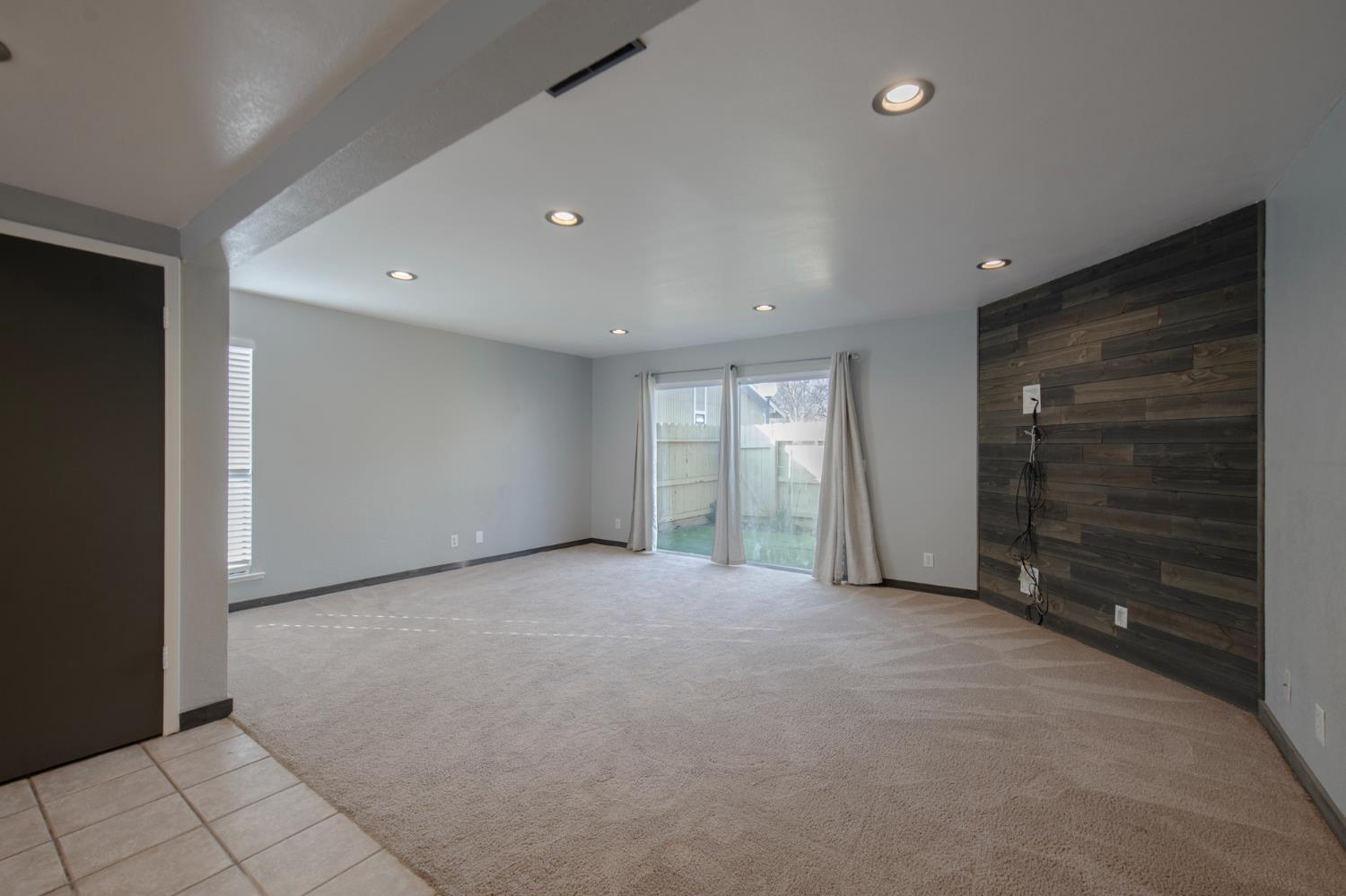 4875 North Backer Avenue, Unit 141 Fresno, CA 93726 - Photo 8 of 23 a view of an empty room with closet and cabinet