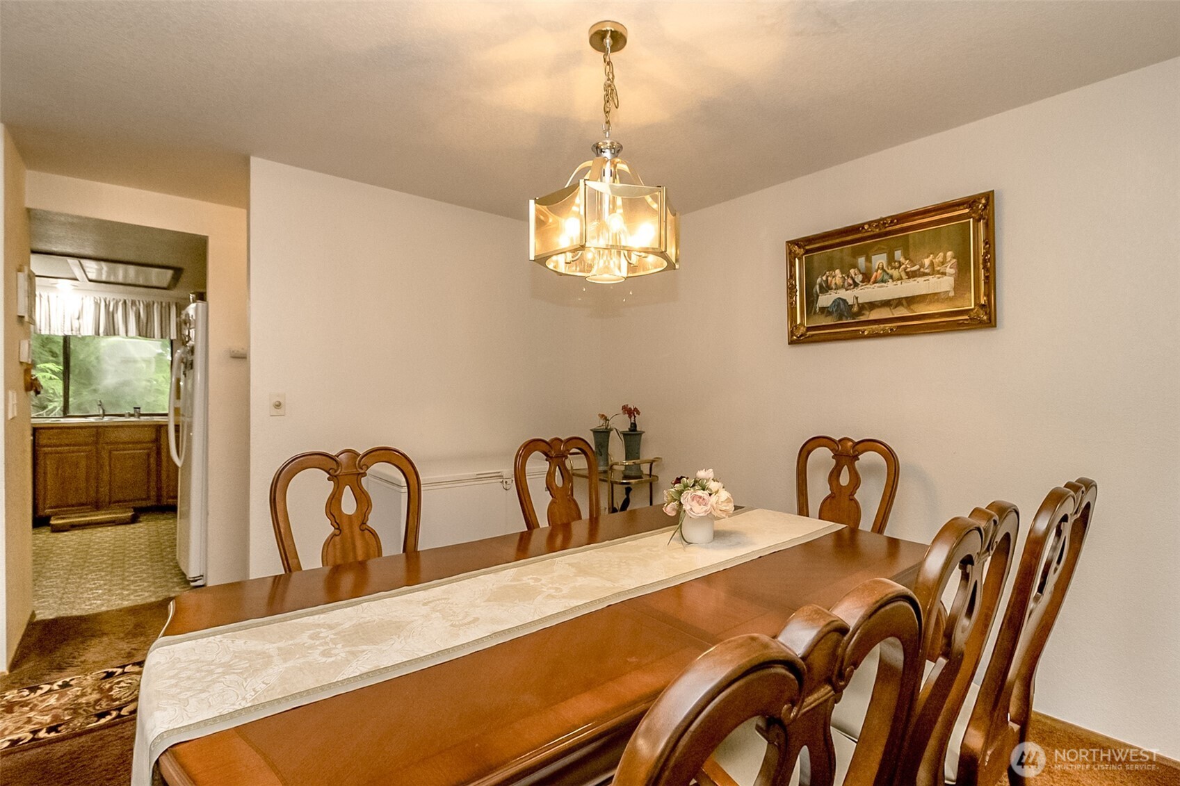 22121 4th Avenue Southeast Bothell, WA 98021 - Photo 9 of 22 a front view of a dining room with furniture