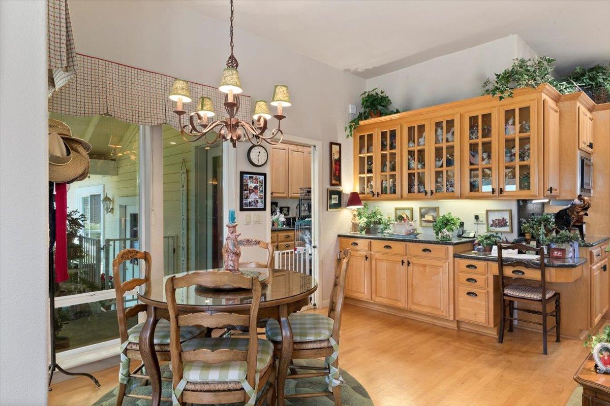 4558 Country View Court Cool, CA 95614 - Photo 27 of 82 a view of a dining room with furniture and chandelier