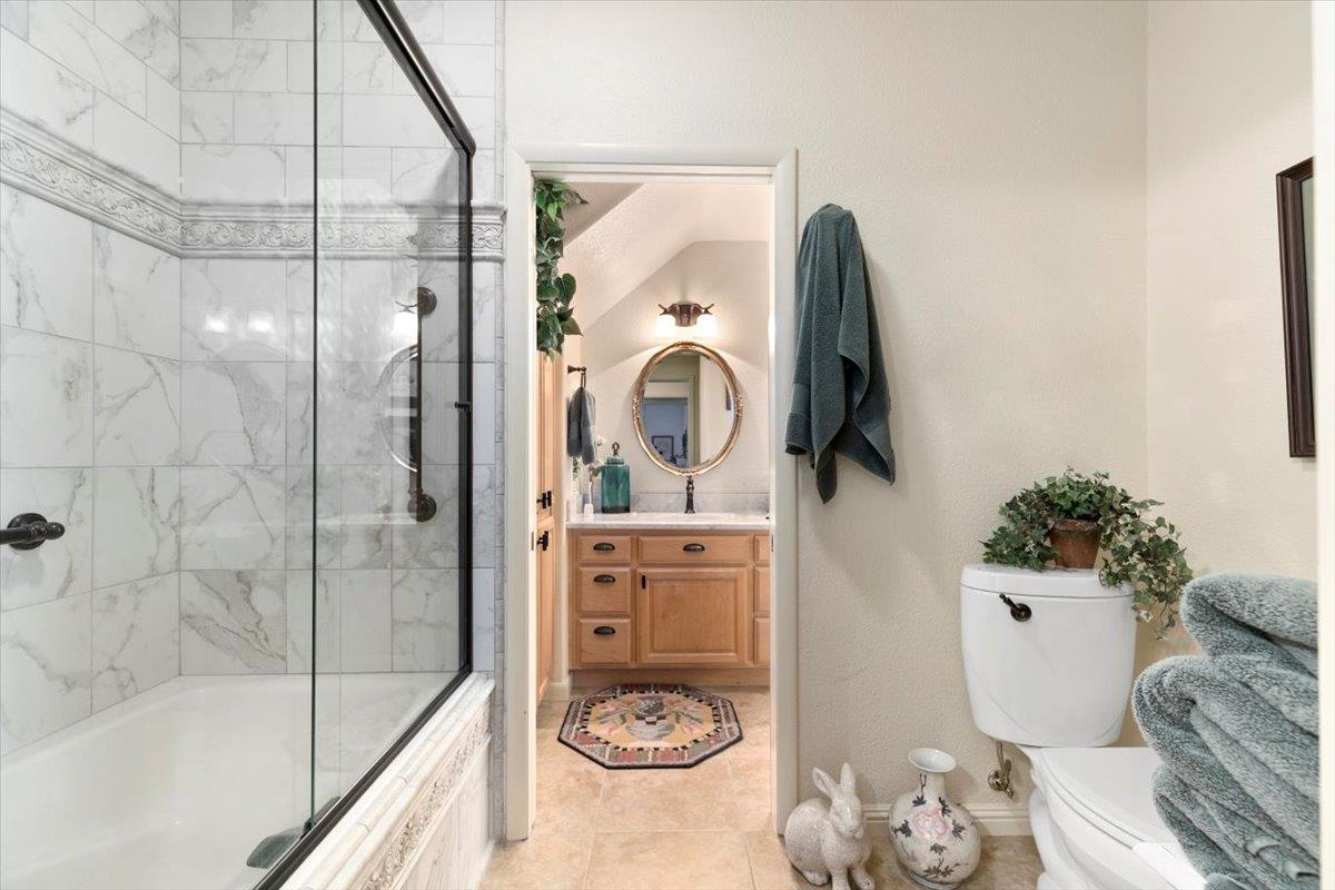 4558 Country View Court Cool, CA 95614 - Photo 35 of 82 a bathroom with a sink toilet and shower
