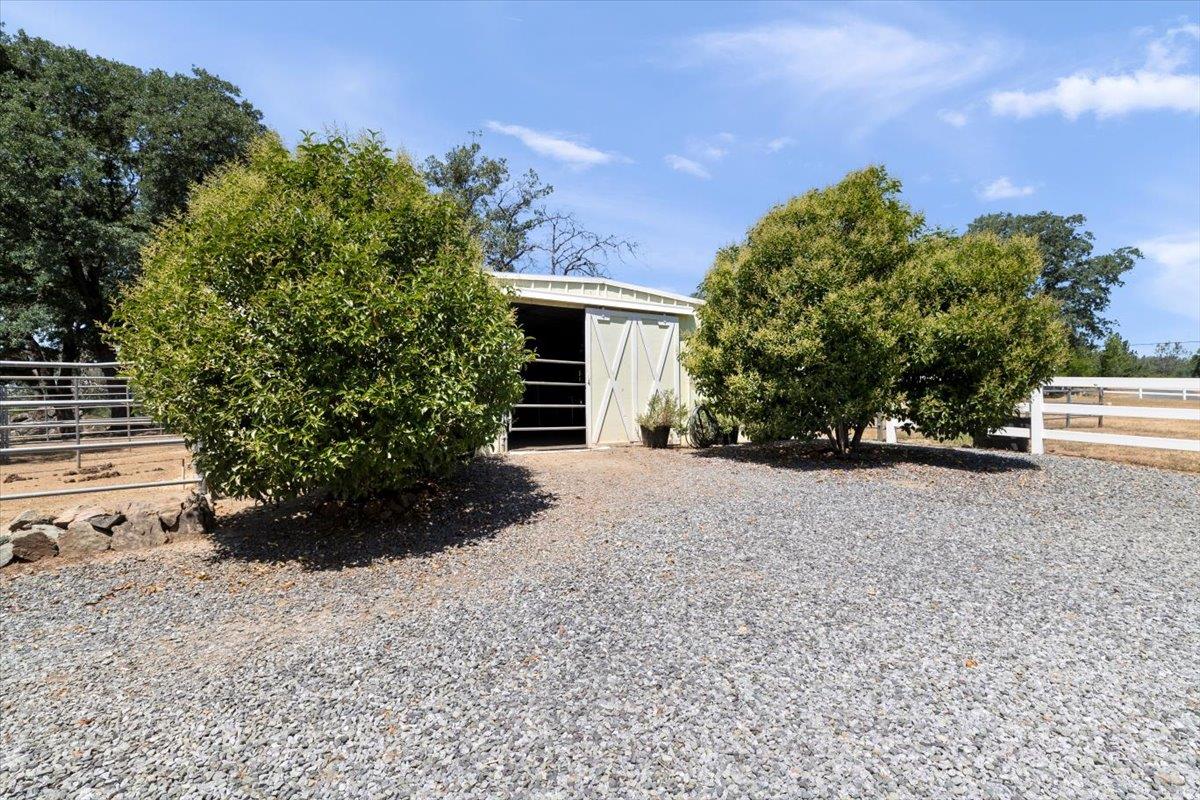 4558 Country View Court Cool, CA 95614 - Photo 49 of 82 a view of a house with a yard and garage