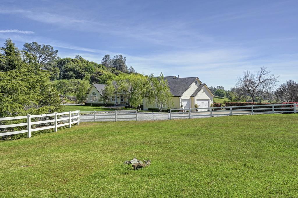 4558 Country View Court Cool, CA 95614 - Photo 63 of 82 a view of a house with a yard