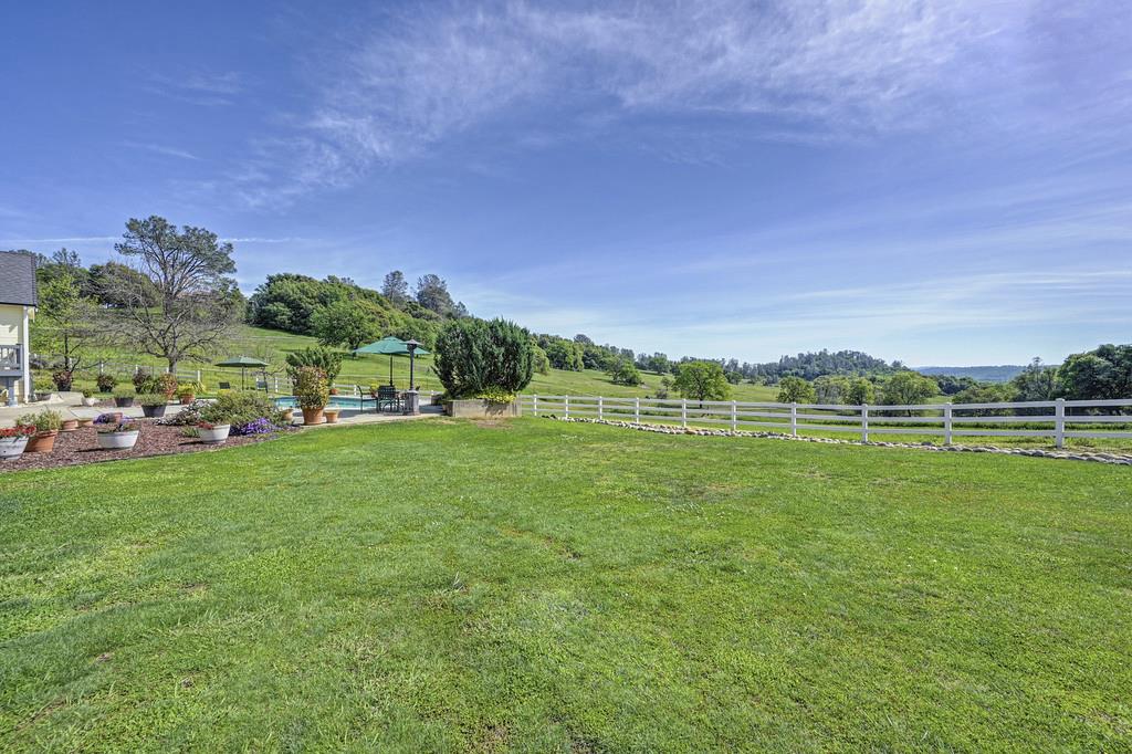 4558 Country View Court Cool, CA 95614 - Photo 69 of 82 a view of a green field with clear sky