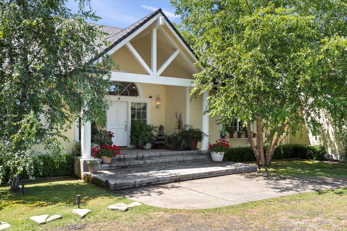 4558 Country View Court Cool, CA 95614 - Photo 7 of 82 a front view of a house with garden