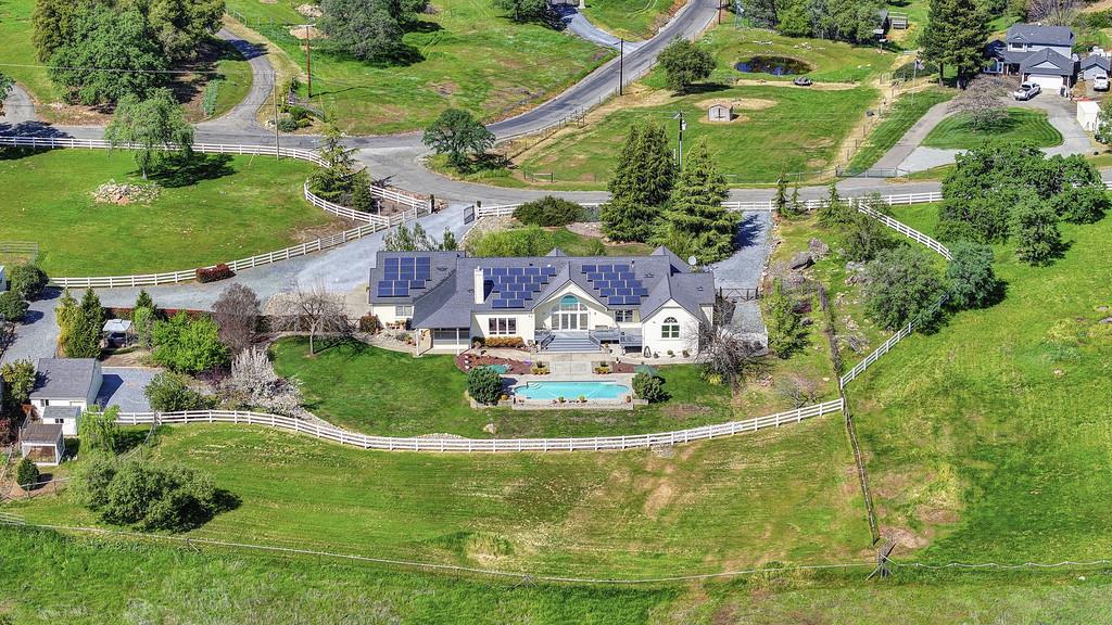 4558 Country View Court Cool, CA 95614 - Photo 81 of 82 an aerial view of a house with a yard