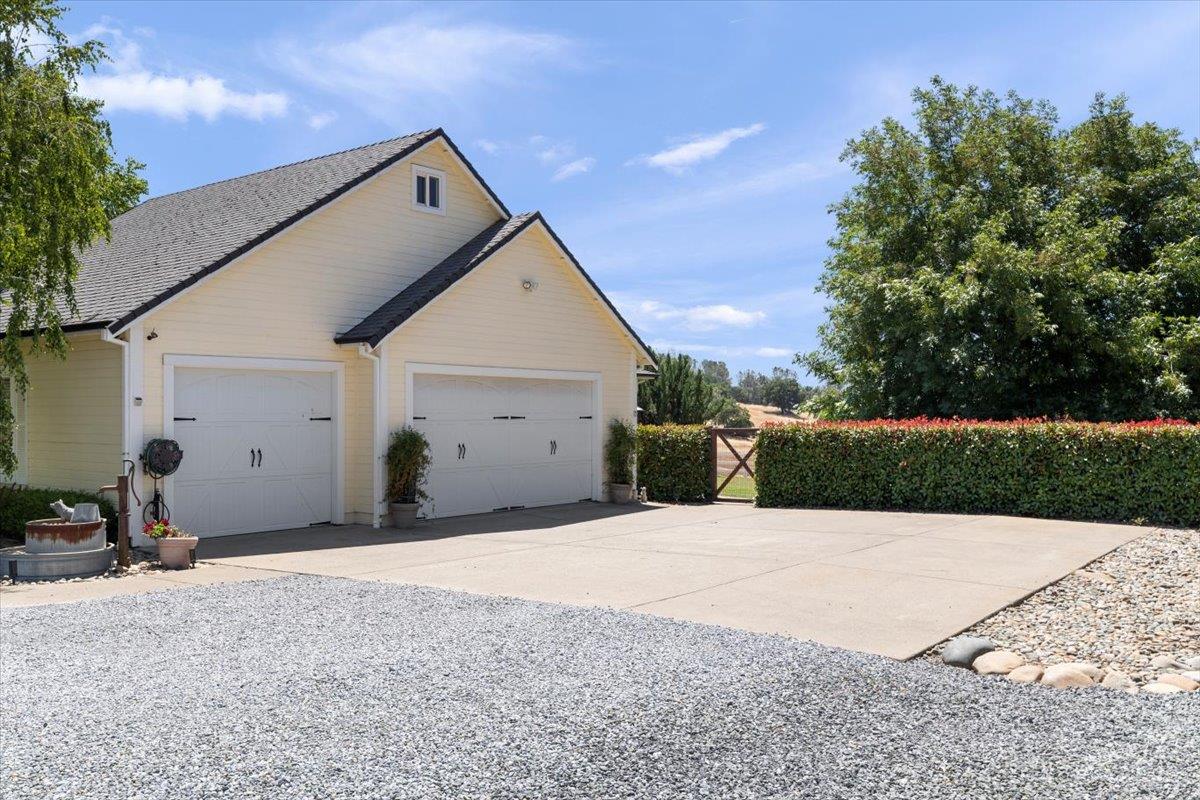 4558 Country View Court Cool, CA 95614 - Photo 9 of 82 a front view of a house with a yard